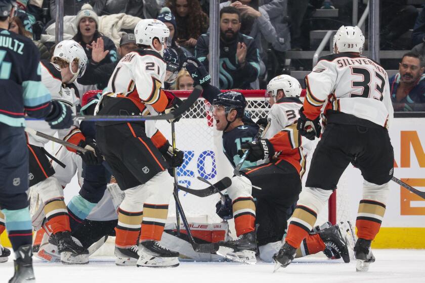 Seattle Kraken center Jaden Schwartz (17) reacts after scoring on Anaheim Ducks goaltender Lukas Dostal.